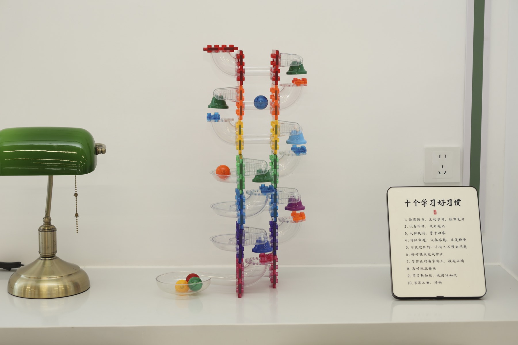 Tall music magnetic construction with bell elements